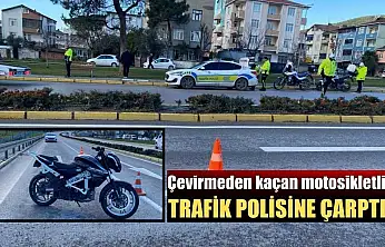 Çevirmeden kaçan motosikletli trafik polisine çarptı