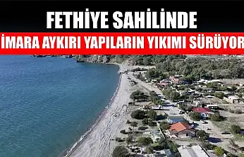 Fethiye sahilinde imara aykırı yapıların yıkımı sürüyor