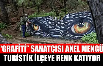 'Grafiti' sanatçısı Axel Mengü, turistik ilçeye renk katıyor