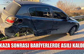Kaza sonrası bariyerlerde asılı kaldı