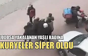 Lodosa yakalanan yaşlı kadına kuryeler siper oldu