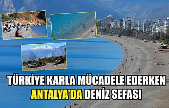Türkiye karla mücadele ederken Antalya'da deniz sefası