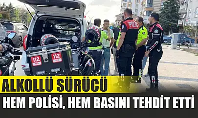 Alkollü sürücü hem polisi hem basını tehdit etti
