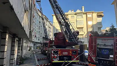 7 katlı binanın çatısı alev alev yandı: Yangın iki binaya sıçradı