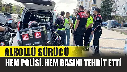 Alkollü sürücü hem polisi hem basını tehdit etti