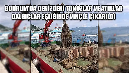 Bodrum'da denizdeki tonozlar ve atıklar dalgıçlar eşliğinde vinçle çıkarıldı