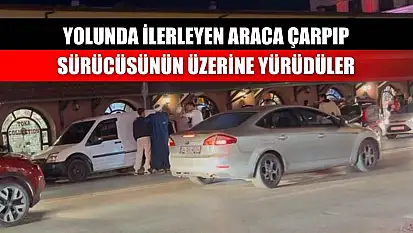 Yolunda ilerleyen araca çarpıp sürücüsünün üzerine yürüdüler