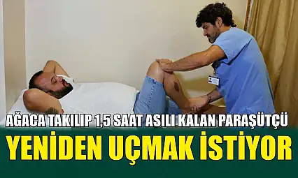 Ağaca takılıp 1,5 saat asılı kalan paraşütçü, yeniden uçmak istiyor