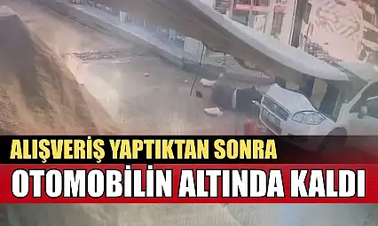 Alışveriş yaptıktan sonra otomobilin altında kaldı