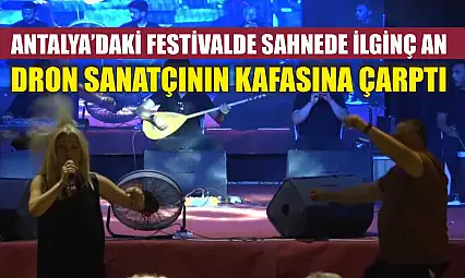 Antalya'daki festivalde sahnede ilginç an: Dron sanatçının kafasına çarptı