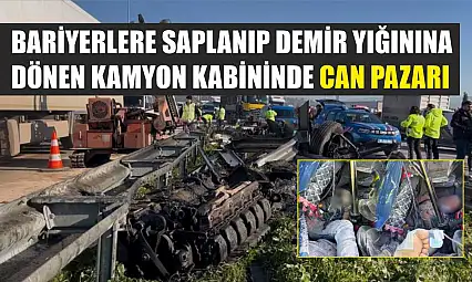 Bariyerlere saplanıp demir yığınına dönen kamyon kabininde can pazarı