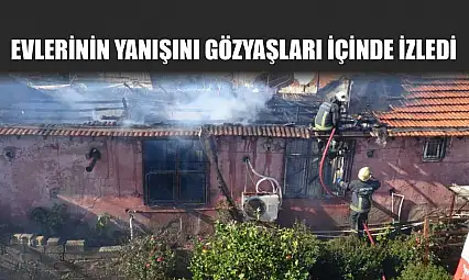 Evlerinin yanışını gözyaşları içinde izledi