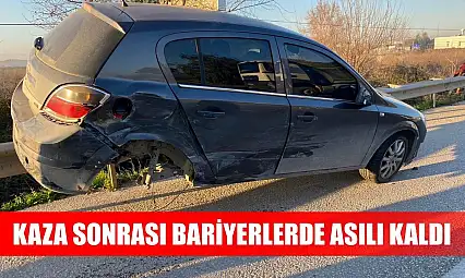 Kaza sonrası bariyerlerde asılı kaldı