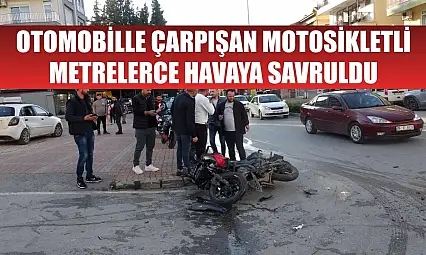 Otomobille çarpışan motosikletli, metrelerce havaya savruldu