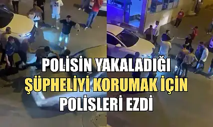 Polisin yakaladığı şüpheliyi korumak için polisleri böyle ezdi