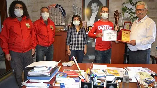 Fethiye AKUT Ekibi'nden Başoğlu'na teşekkür plaketi