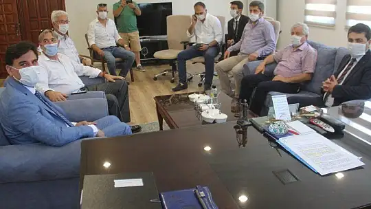 DP Genel Başkanı Gültekin Uysal,  Alim Karaca'yı ziyaret etti