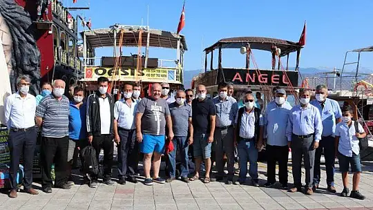 İLÇE BAŞKANI DEMİR'DEN MUHTARLARA JEST