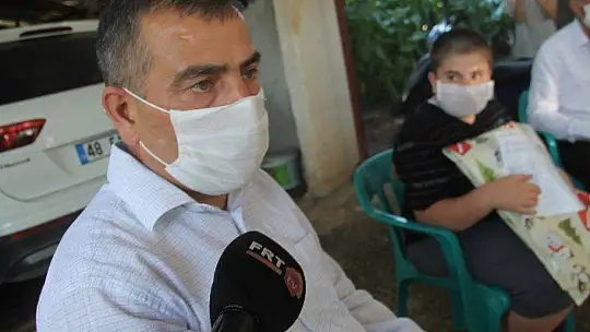 Fethiye'de öğrenciler karnelerini evlerinde aldılar