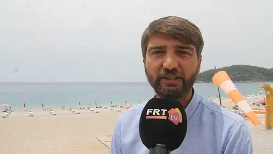 ÖLÜDENİZ'DE MASKELİ GÜNEŞLENDİLER