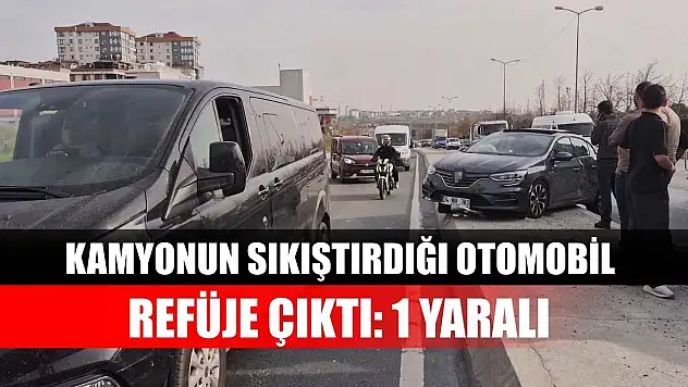 Kamyonun sıkıştırdığı otomobil refüje çıktı: 1 Yaralı