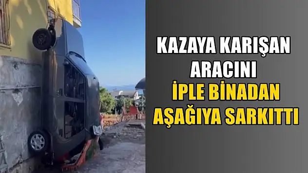 Kazaya karışan aracını iple binadan aşağıya sarkıttı