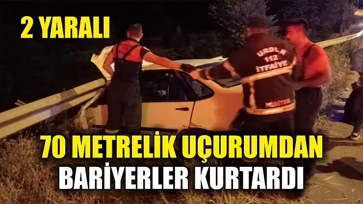 70 metrelik uçurumdan bariyerler kurtardı: 2 yaralı