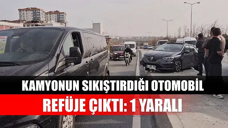 Kamyonun sıkıştırdığı otomobil refüje çıktı: 1 Yaralı