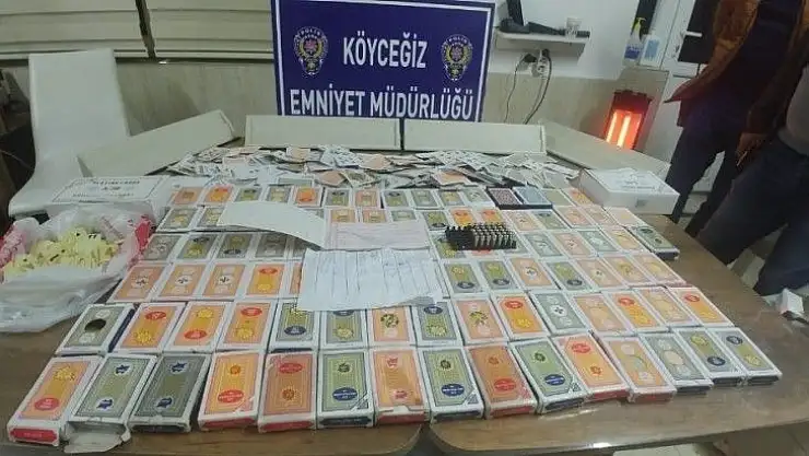 Köyceğiz'de iki eve kumar baskını: 27 kişiye 119 bin 610 lira ceza