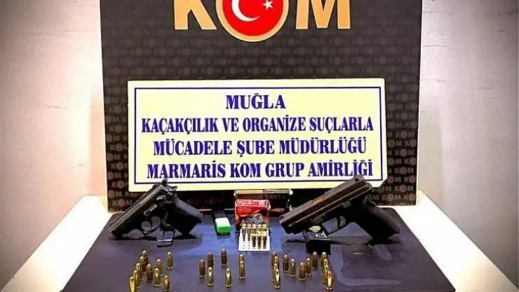 Marmaris'te ruhsatsız silah ve mermiler yakalandı