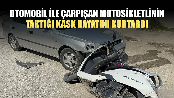 Otomobil ile çarpışan motosikletlinin taktığı kask hayatını kurtardı