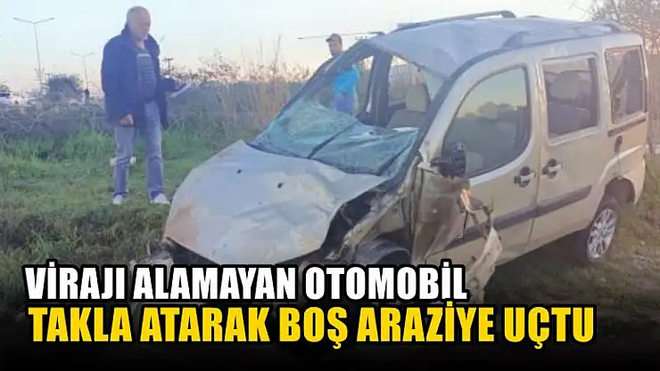 Virajı alamayan otomobil takla atarak boş araziye uçtu
