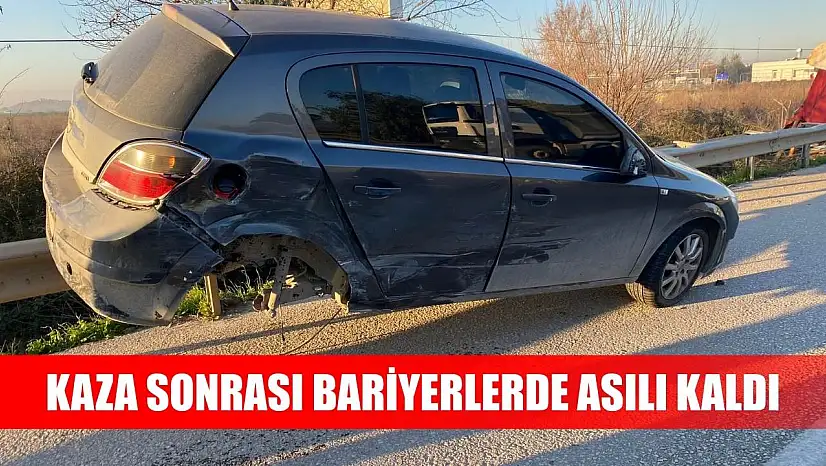 Kaza sonrası bariyerlerde asılı kaldı