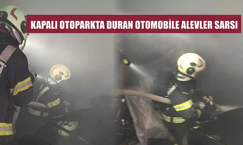 Kapalı otoparkta duran otomobile alevler sarsı