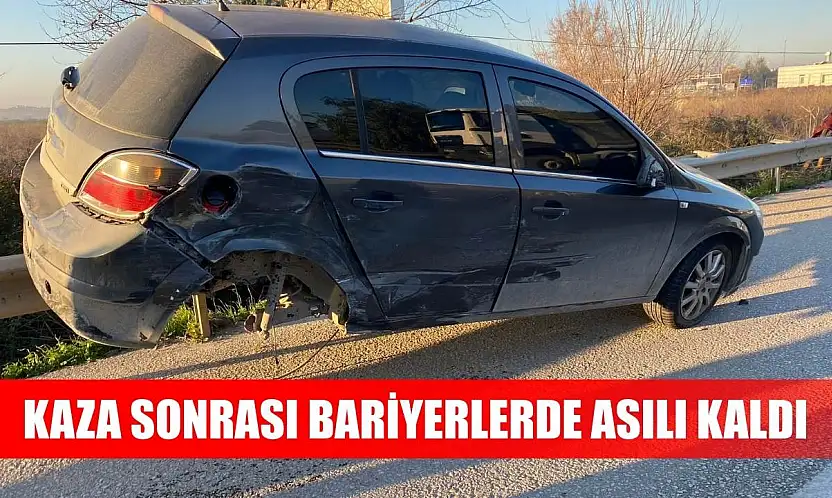 Kaza sonrası bariyerlerde asılı kaldı