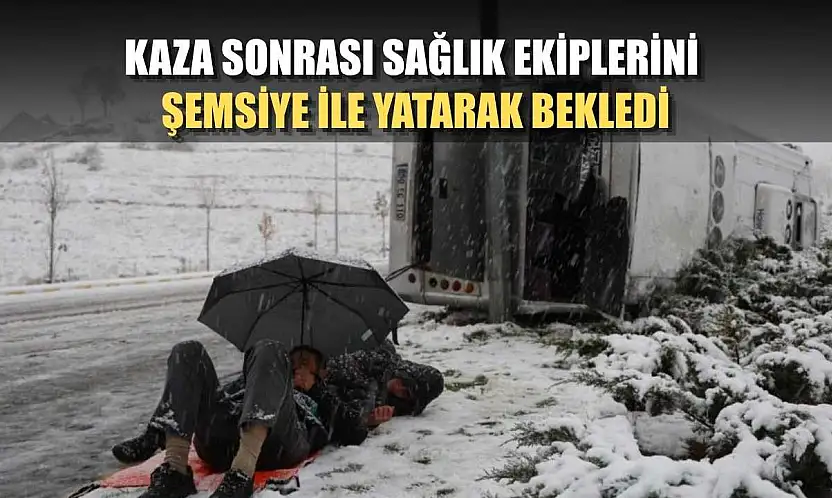 Kaza sonrası sağlık ekiplerini şemsiye ile yatarak bekledi