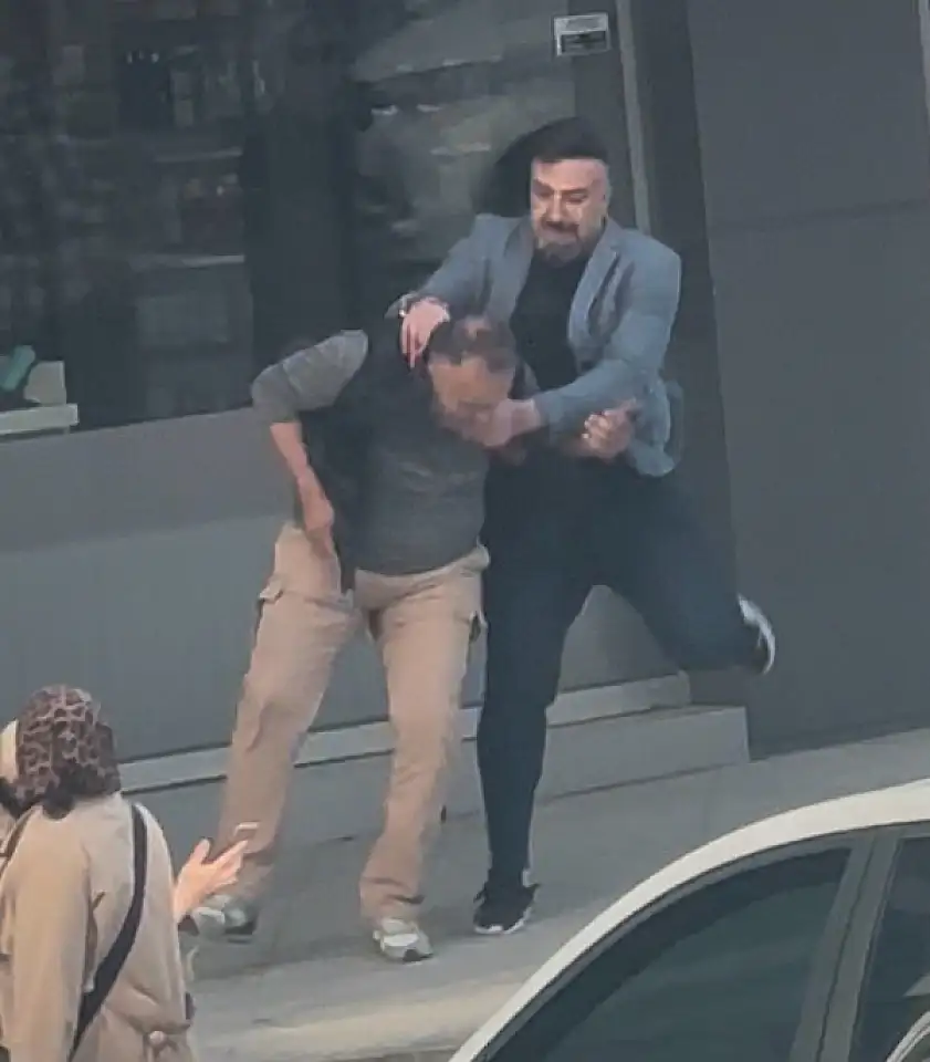 Kendisini silahla vuran şüpheliyi kovalayıp yere yıktı