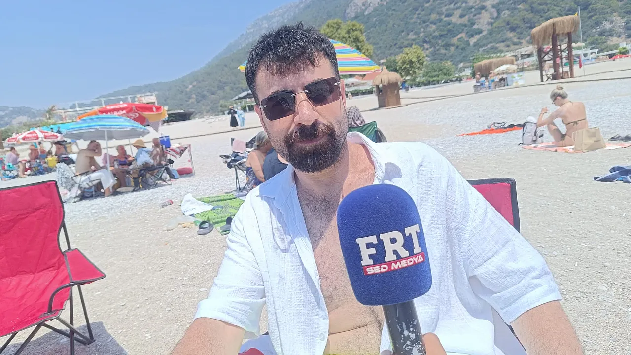 Fethiye Belcekız Plajı tatilcilerin gözdesi olmayı sürdürüyor