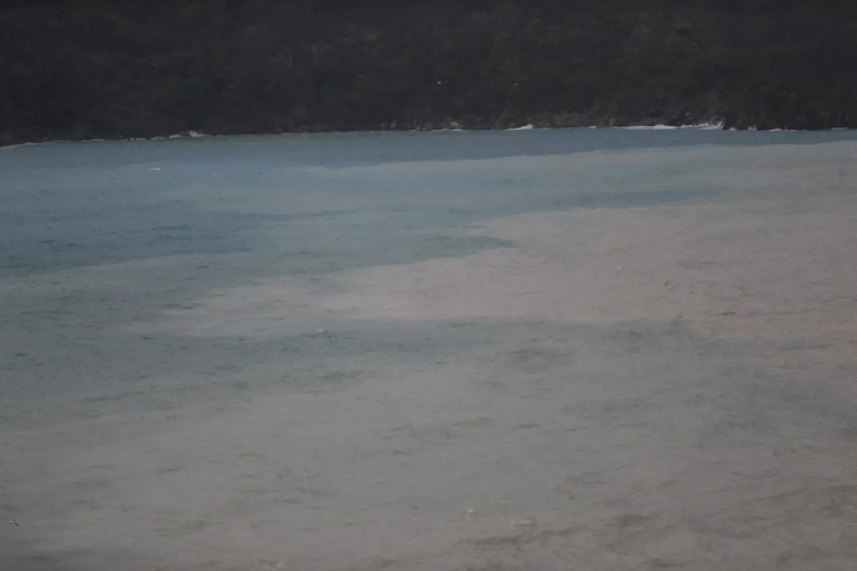 Fethiye'de sağanak sonrası Ölüdeniz'in rengi değişti