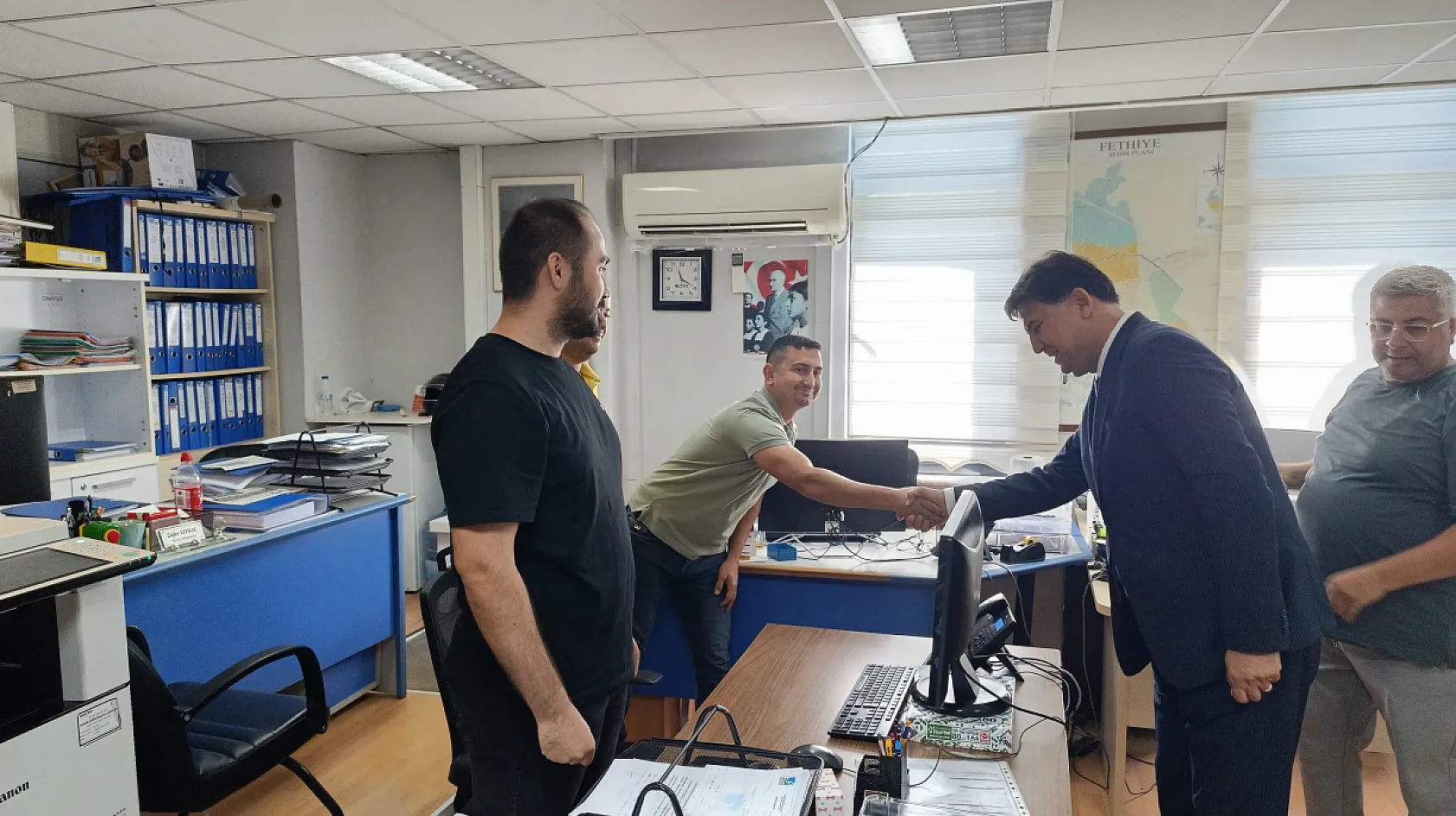 Fethiye Belediye Başkanı Alim Karaca, belediye personeliyle bayramlaştı