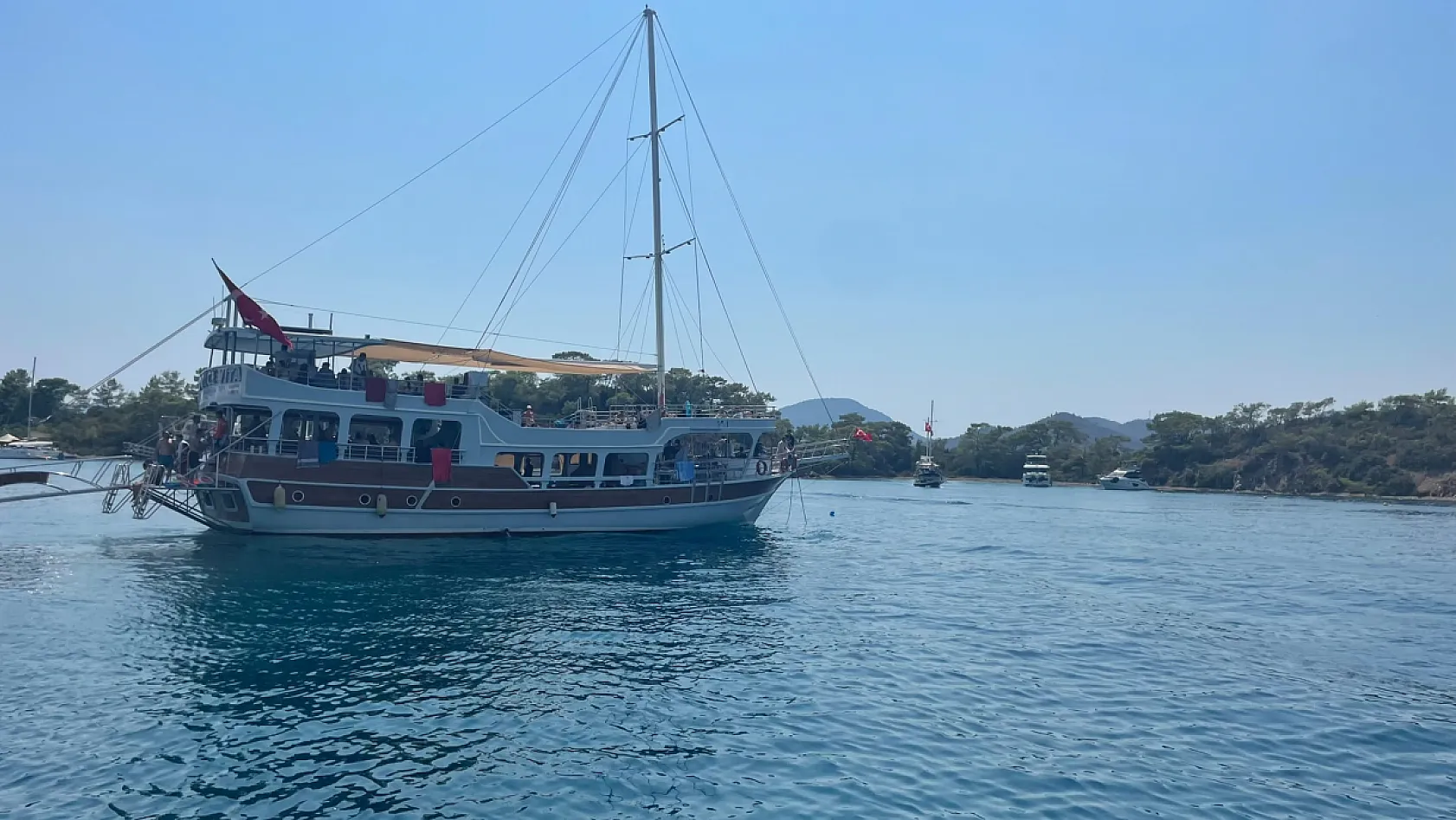 Fethiye'de mavinin keyfini çıkardılar: 'İş stresinden kaçmak için birebir'