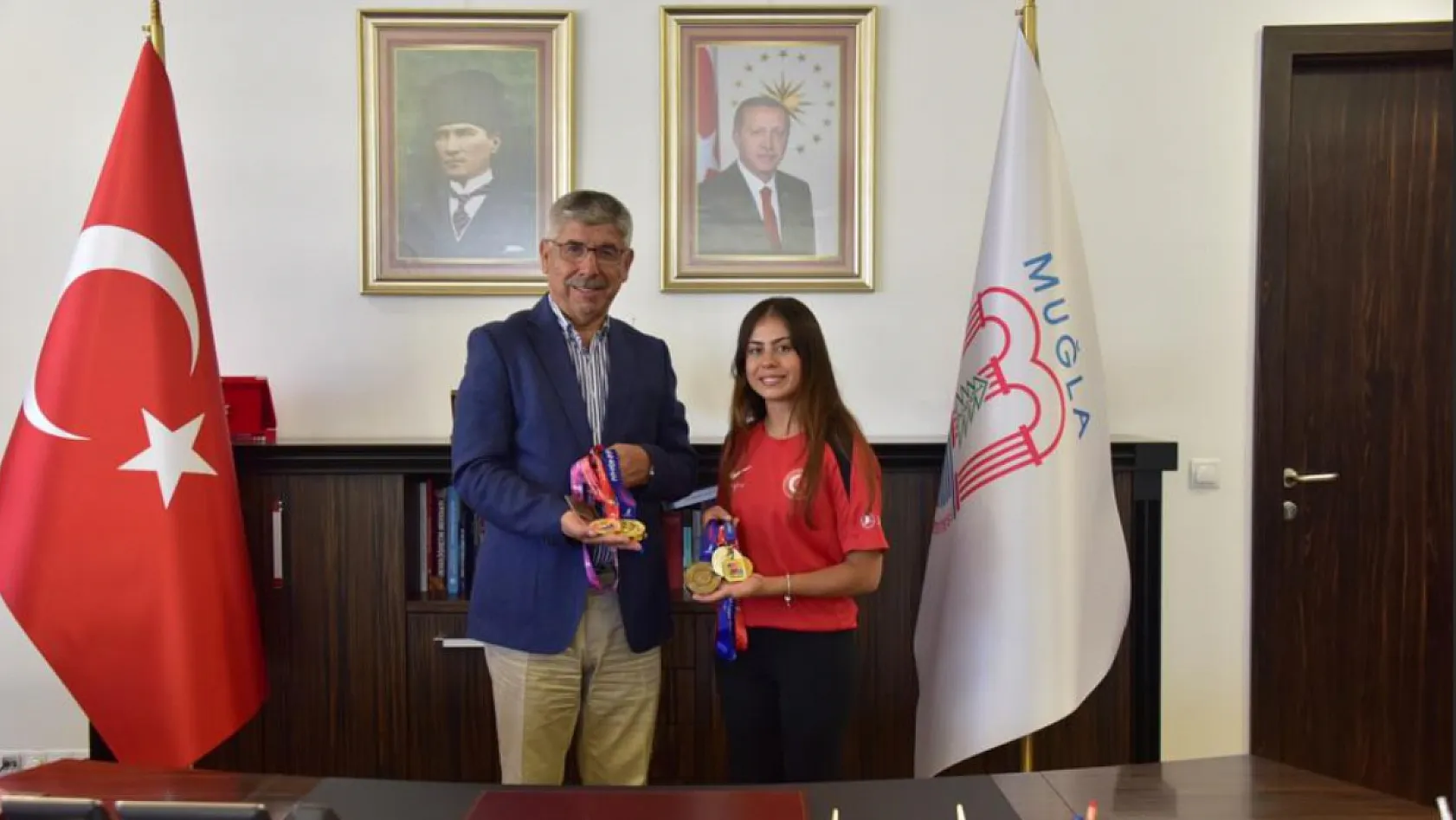 MSKÜ'lü milli sporcu Burun'dan madalya ziyareti