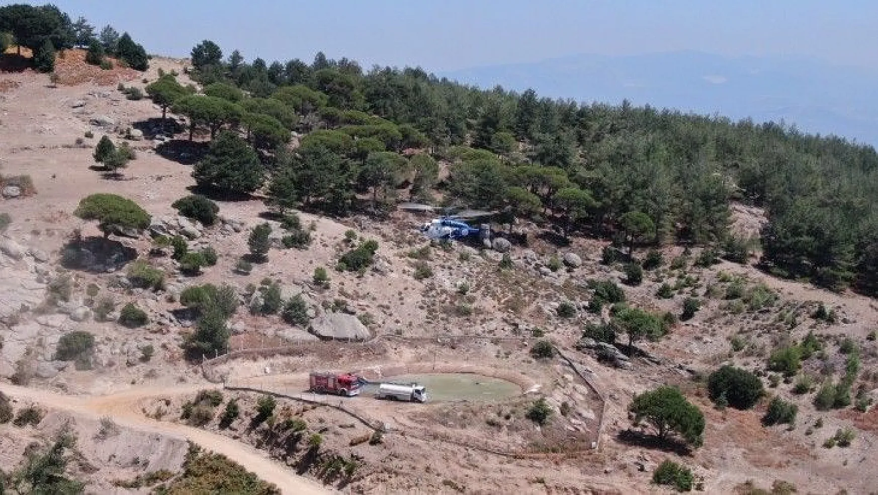 Muğla'da ekipler karadan su taşıdı, helikopter havadan müdahale etti
