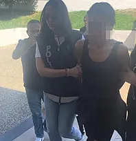 Menteşe'de Türk bayrağını yakmaya çalışan kadın tutuklandı
