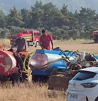 Muğla'da traktörünü ve su tankerini alan yangına koştu
