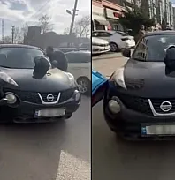 Otomobil sürücüsü ile motosikletli kurye arasındaki gerginlik kamerada
