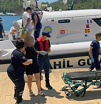 Sahil güvenlik, Fethiye açıklarında gezi teknesi ve ticari yattan iki kişiye tıbbi tahliye gerçekleştirdi