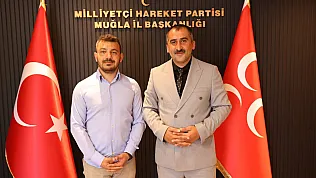 MHP Fethiye İlçe Başkanlığı'nda görev değişimi: Hüseyin Mukyen'in yerine Tuğrul Öztürkçü atandı