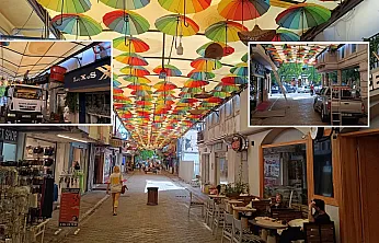 Fethiye'de yağmurun ardından Şemsiyeli Sokak'ta onarım çalışması