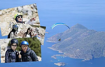 Fethiye'de yamaç paraşütü uçuşlarında Çinli tursit yoğunluğu yaşanıyor